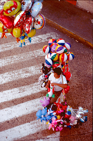 Man with baloons in Egypt.