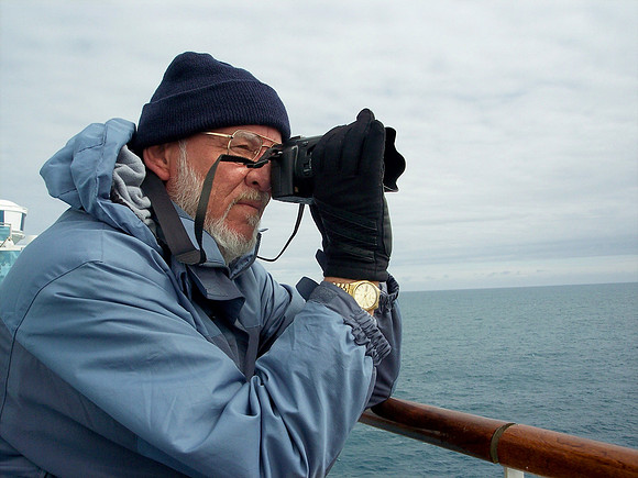 Male photographer on ship - Elephant Island, Antarctica
