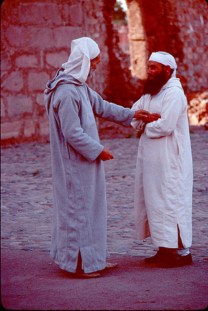 Greetings between two men.