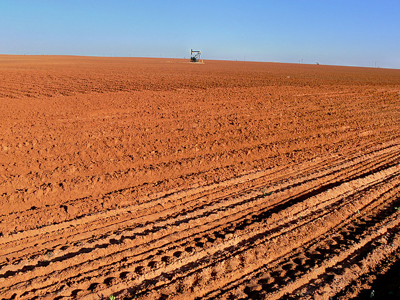 Texas Panhandle - Preparing cotton field for planting.