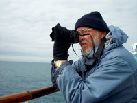 Male photographer on ship - Elephant Island, Antarctica