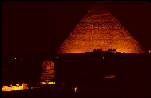 Night view of the Sphinx and Great Pyramid.