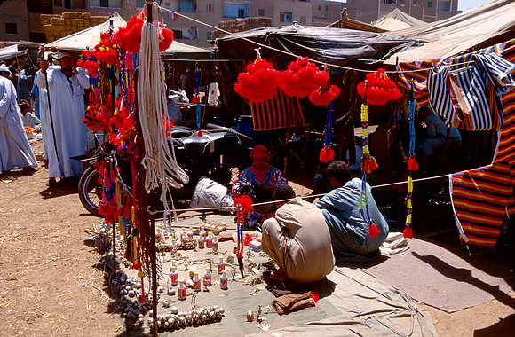 Selling supplies at the camel market.
