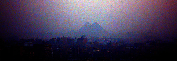 Pyramids seen thru the smog of Cairo.