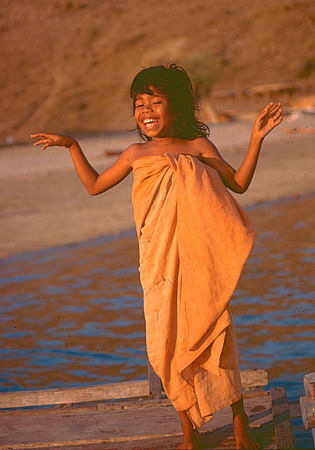 Smiling young girl on the Island of Komodo.