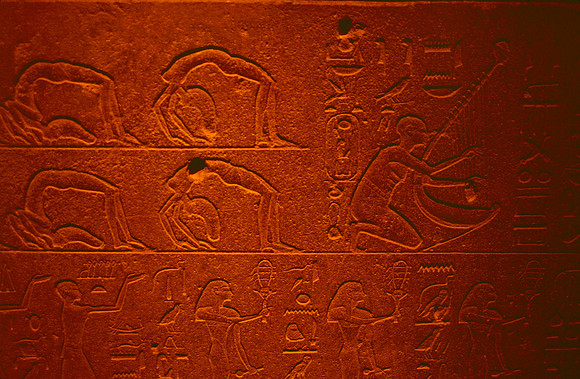 Egyptian  hieroglyphs and paintings.