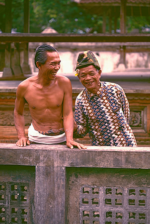 Two men at temple on the Island of Lumbok, Indonesia